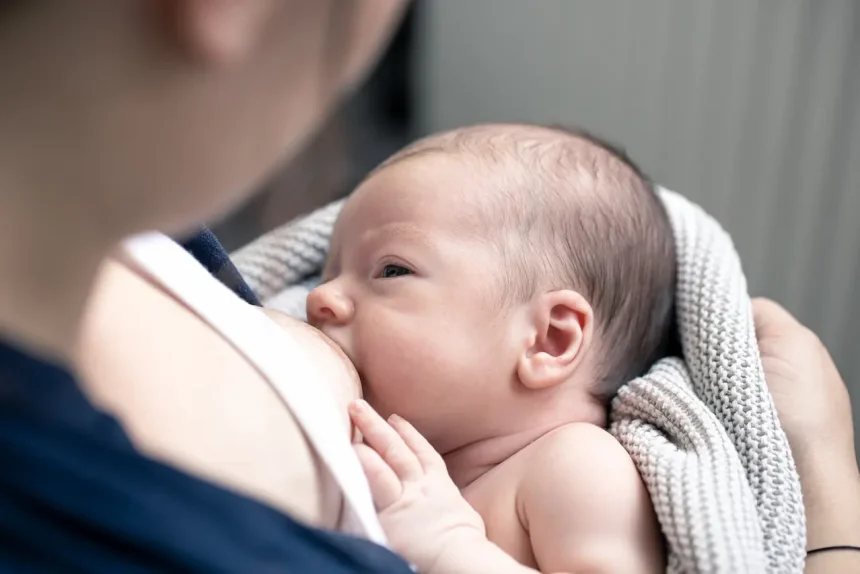 mom-breastfeeds-her-newborn-son-breastfeeding-lactation-women-happy-motherhood